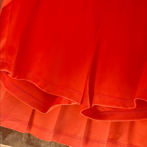 Izod Coral Pleated Back Women's Golf Skort - Picture 3 of 8